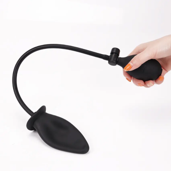 Inflatable anal plug